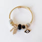 Gold Charm Bracelet – Emerald Crystal & Evil Eye