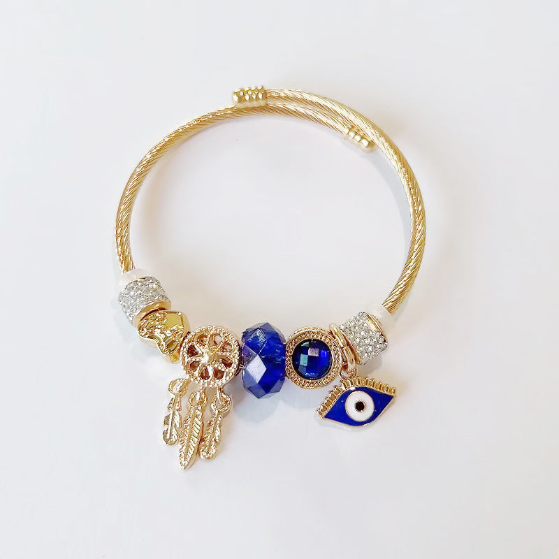 Gold Charm Bracelet – Emerald Crystal & Evil Eye
